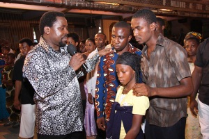 TB Joshua with Favour and family